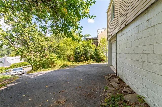a view of a backyard of the house