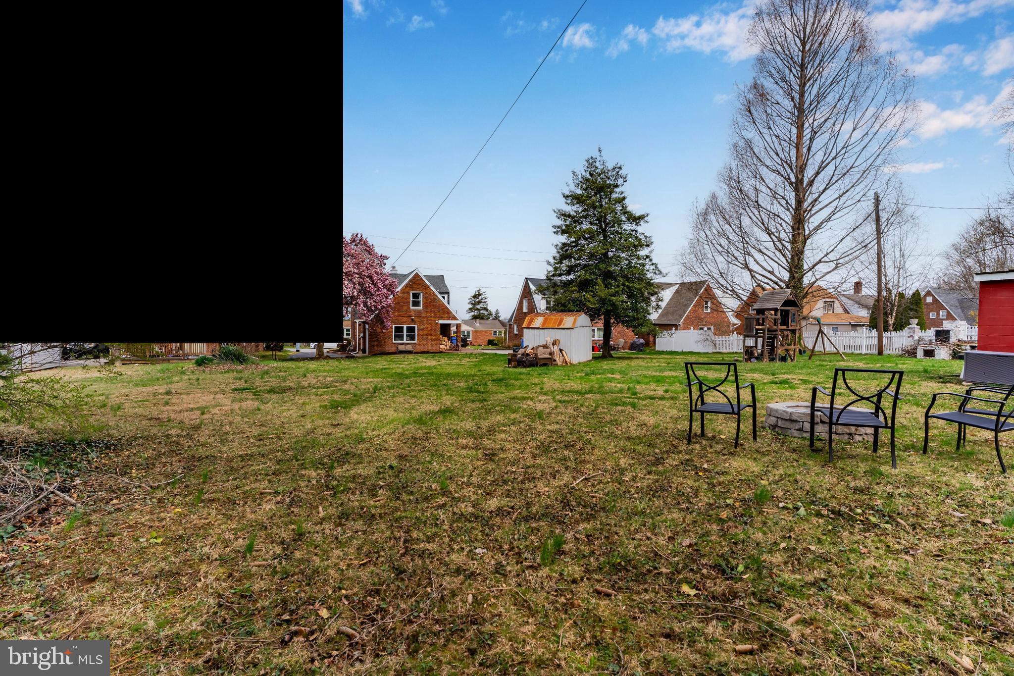 456 Edgehill Road York, PA 17403 - Photo 7 of 25 a view of a bench in backyard of house