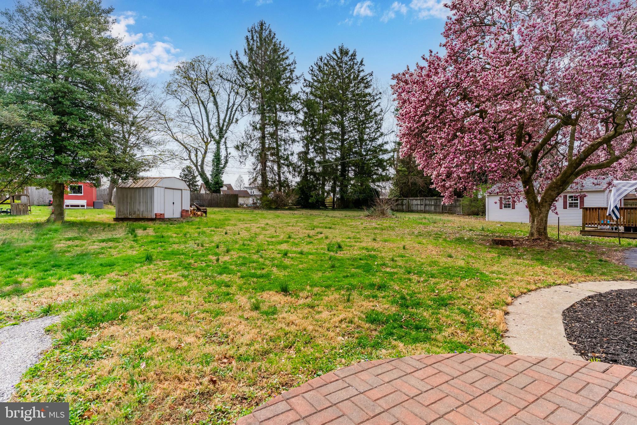 456 Edgehill Road York, PA 17403 - Photo 8 of 25 a view of a backyard with large trees