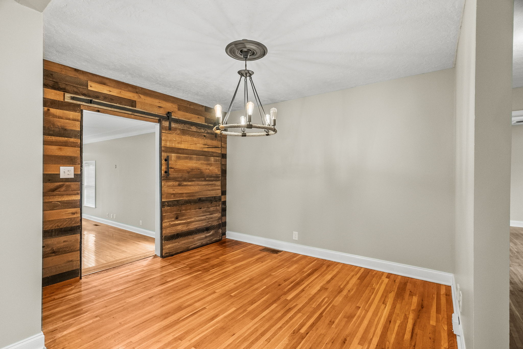 4120 Sycamore Road Greenbrier, TN 37073 - Photo 12 of 31 an empty room with wooden floor closet and windows