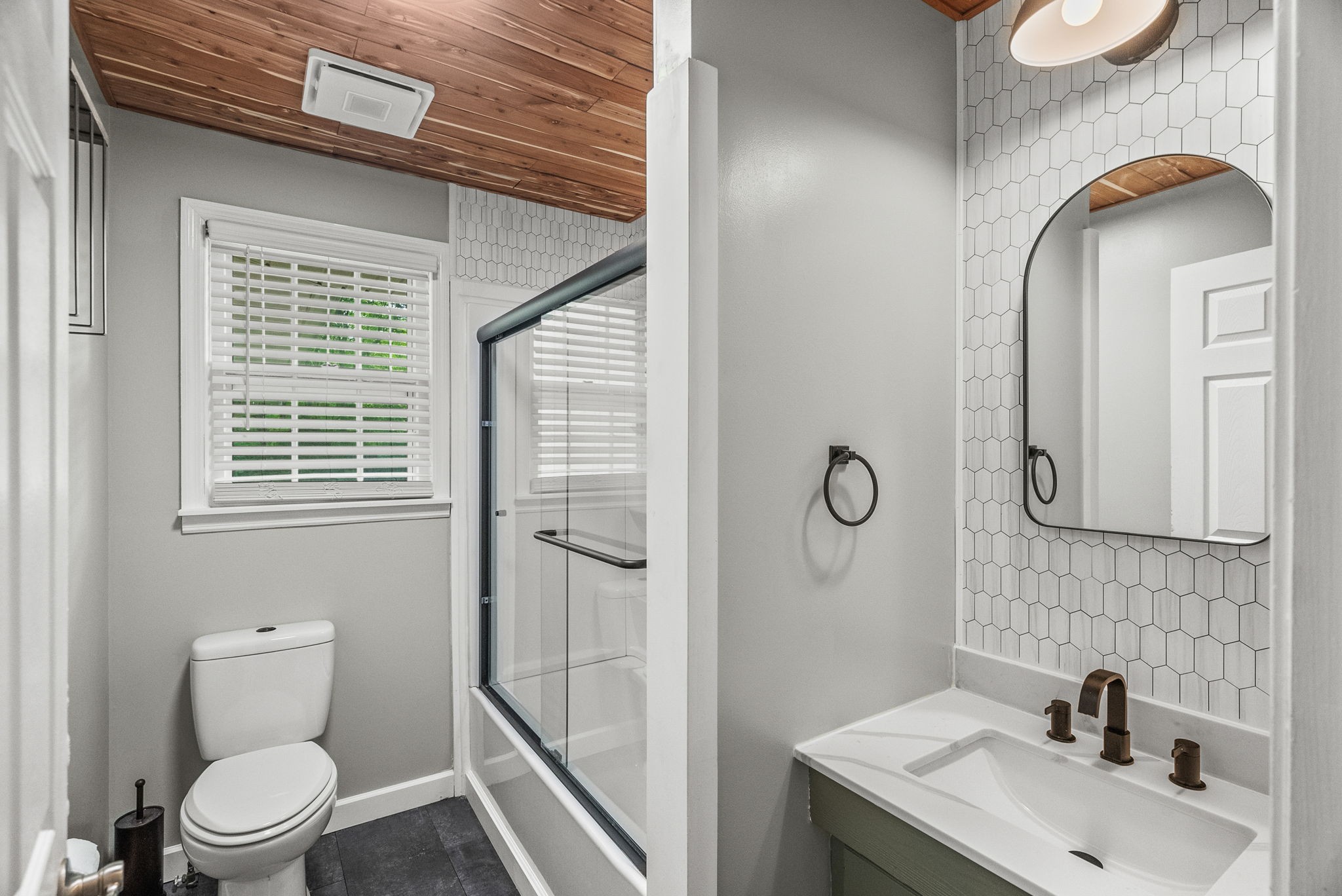 4120 Sycamore Road Greenbrier, TN 37073 - Photo 16 of 31 a bathroom with a sink a toilet and shower
