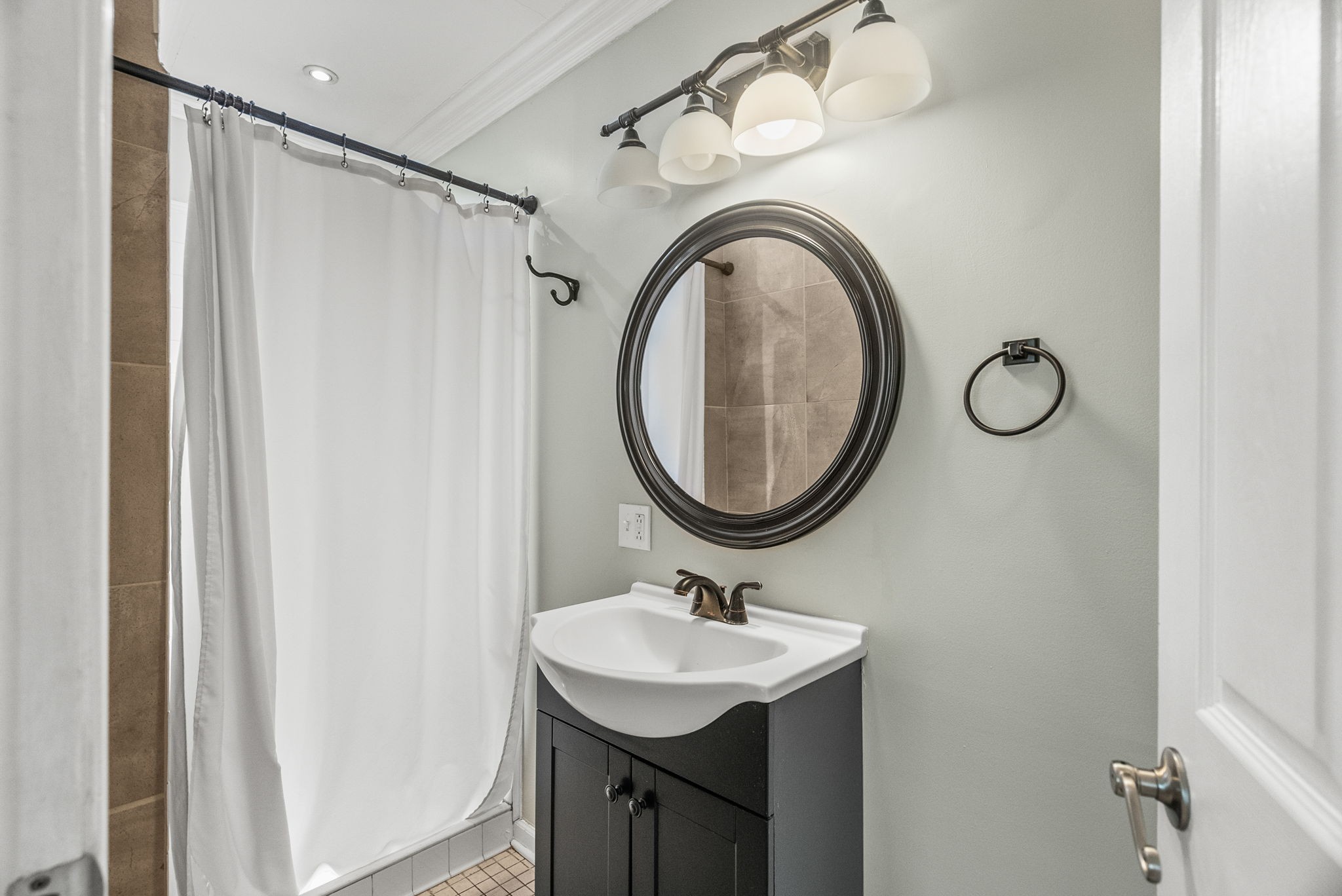 4120 Sycamore Road Greenbrier, TN 37073 - Photo 20 of 31 a bathroom with a sink and a mirror