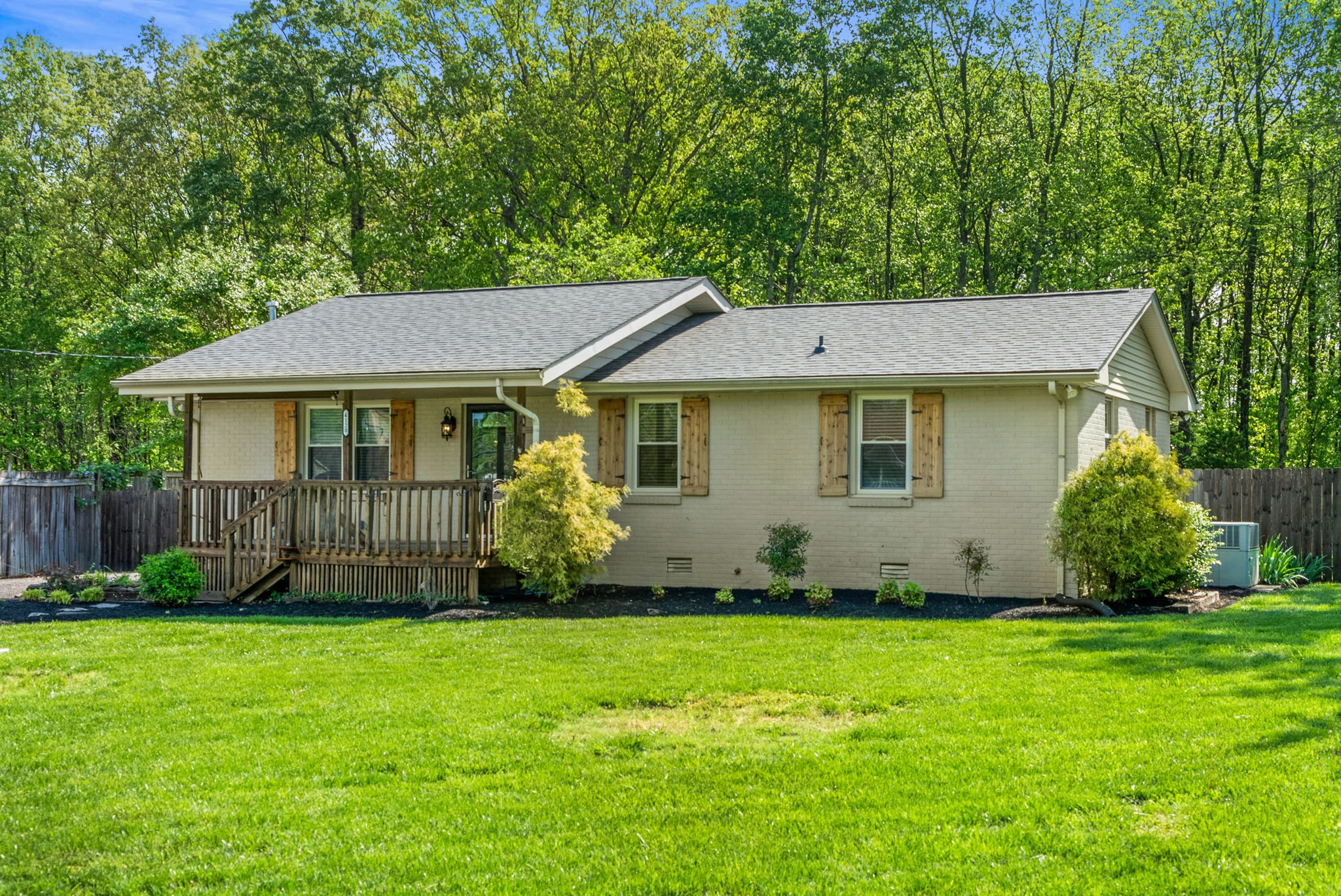 4120 Sycamore Road Greenbrier, TN 37073 - Photo 2 of 31 a front view of a house with a garden