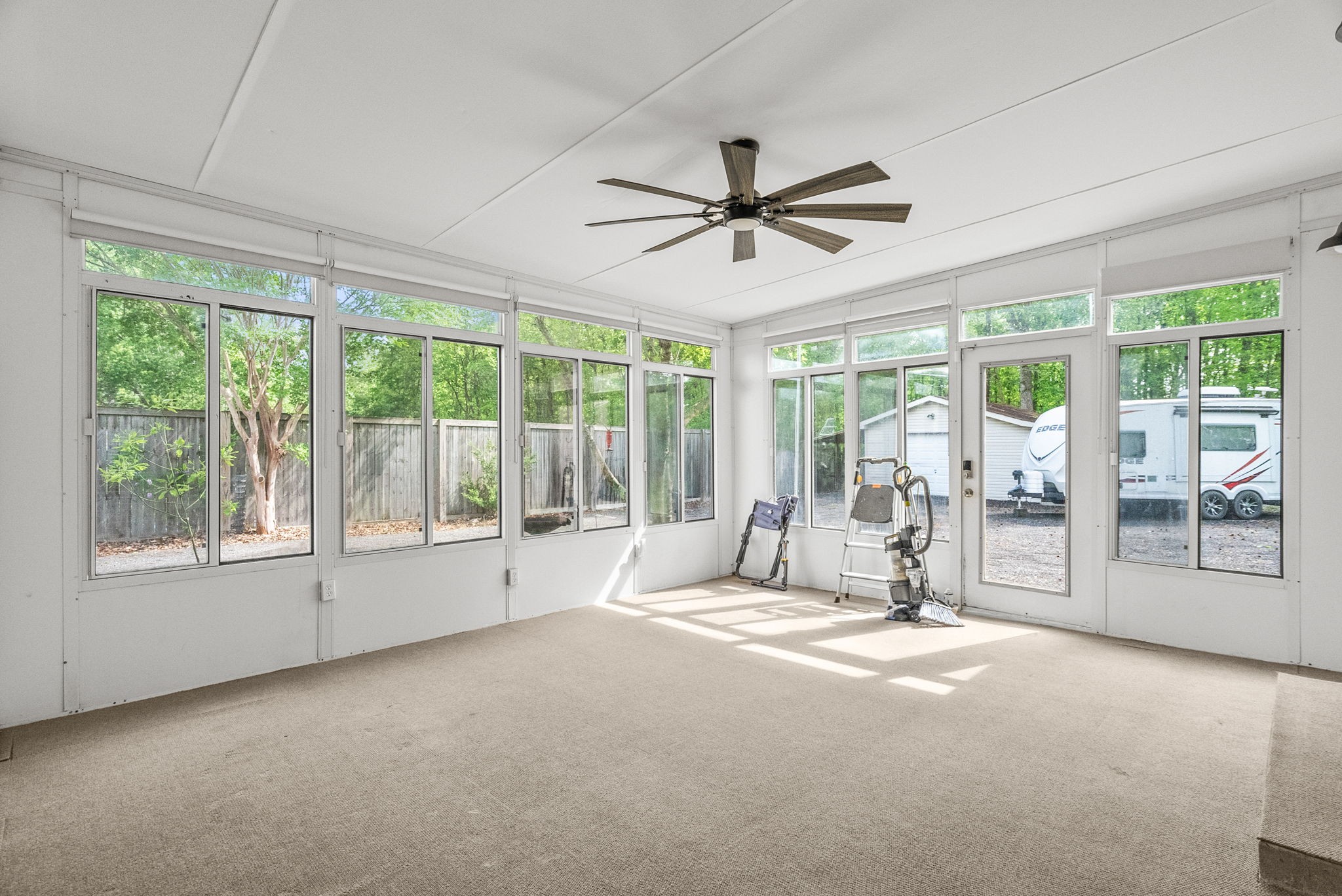 4120 Sycamore Road Greenbrier, TN 37073 - Photo 23 of 31 a view of a livingroom with a ceiling fan and window
