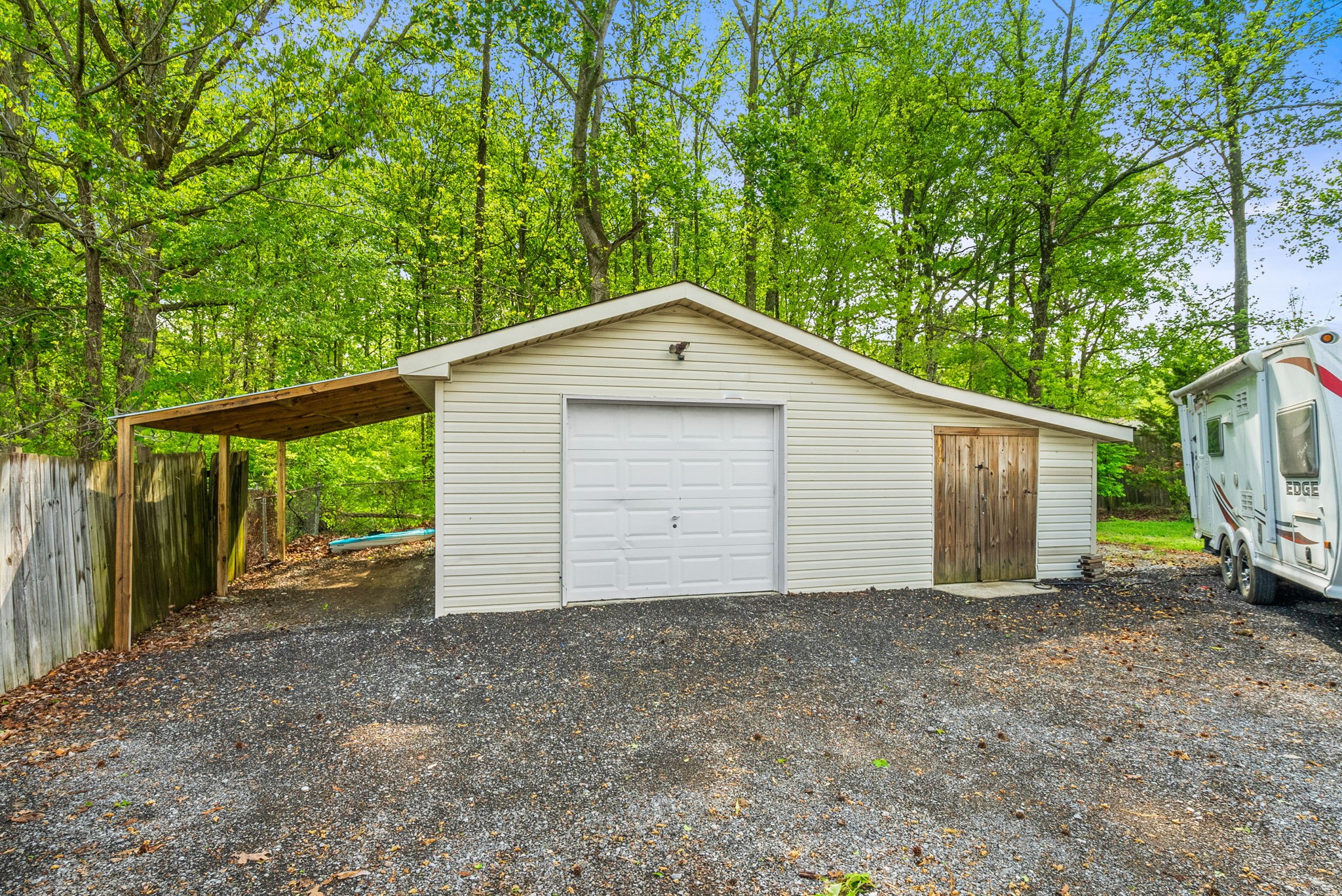 4120 Sycamore Road Greenbrier, TN 37073 - Photo 26 of 31 a view of a house with a yard and garage