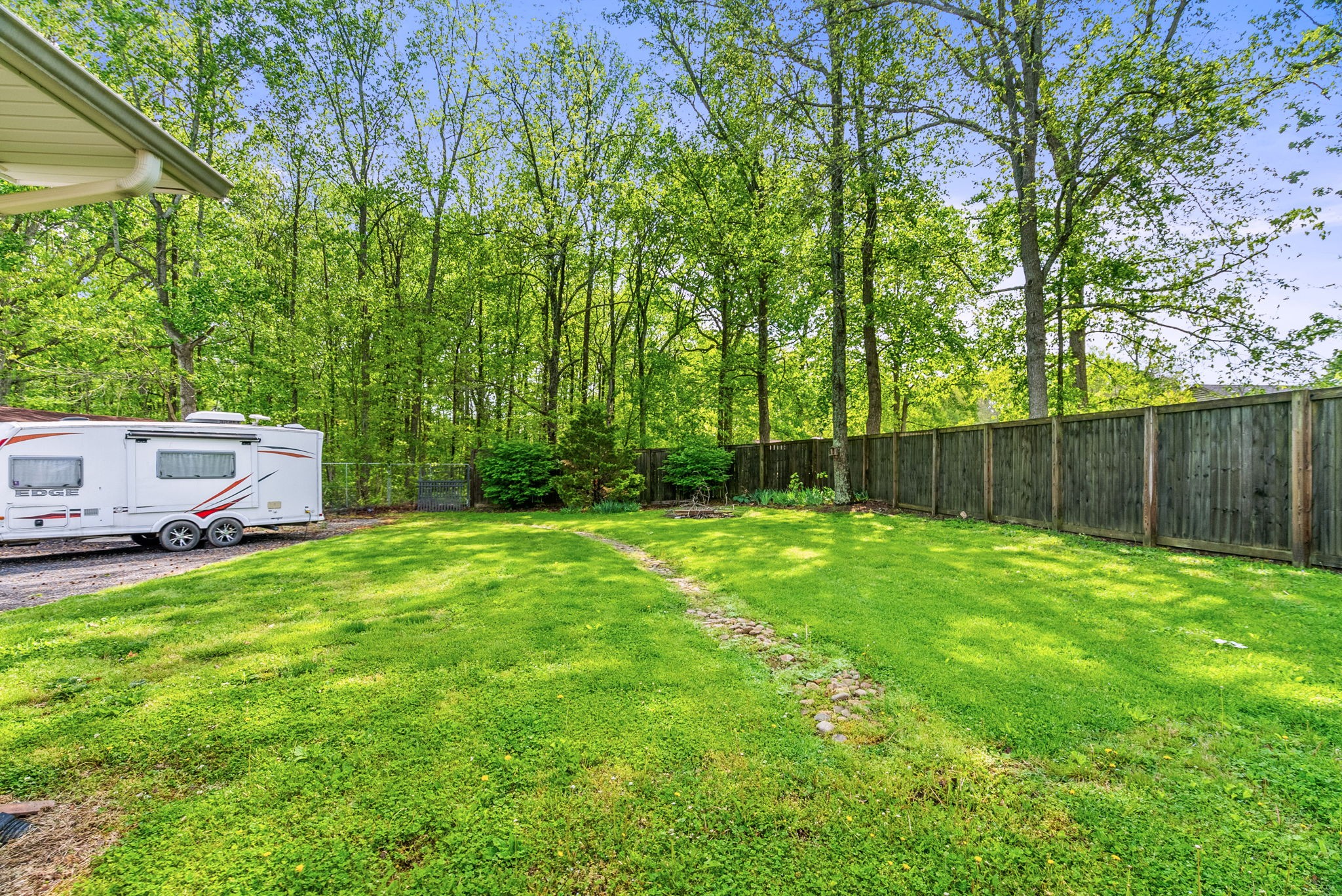 4120 Sycamore Road Greenbrier, TN 37073 - Photo 28 of 31 a backyard of a house with lots of green space