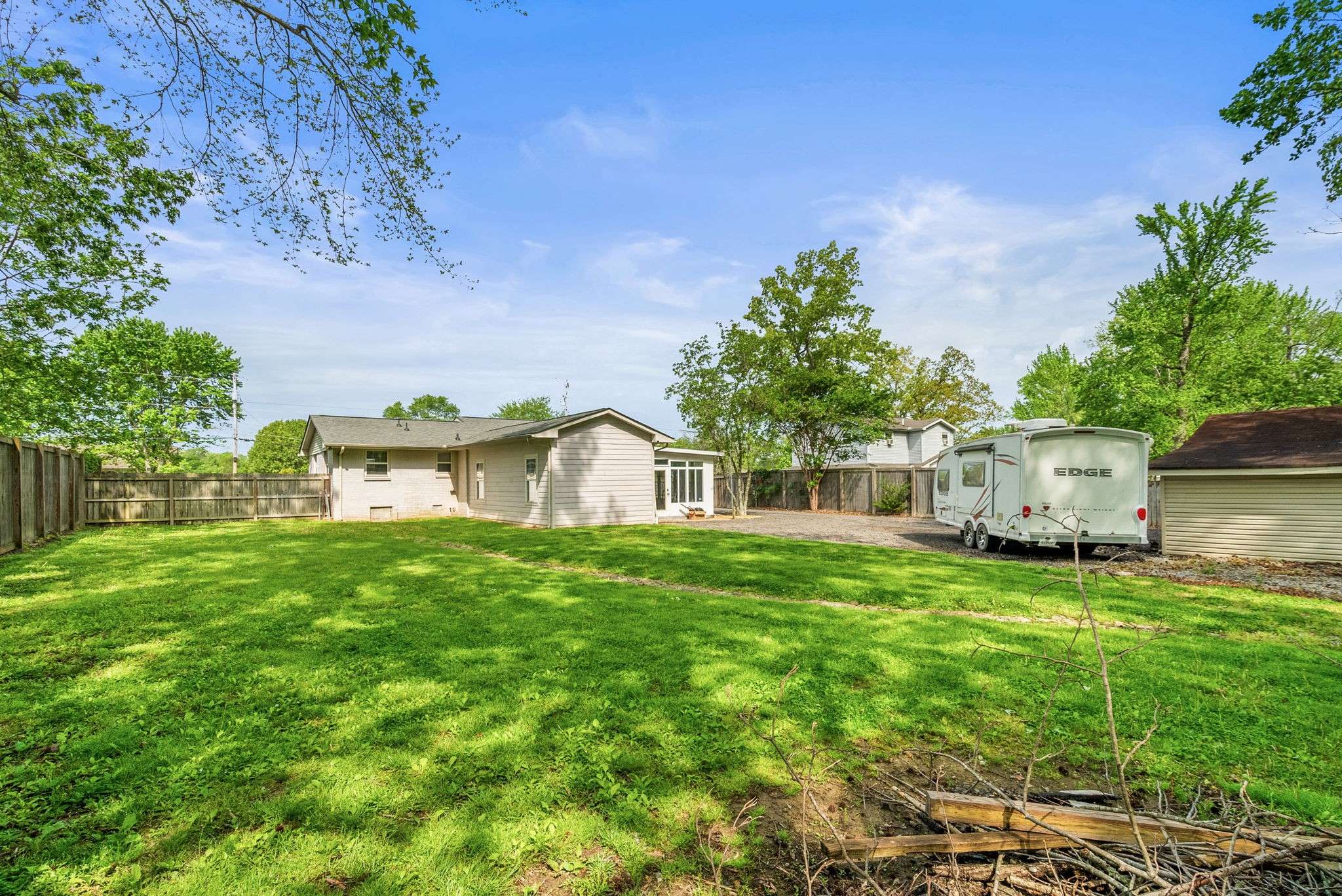 4120 Sycamore Road Greenbrier, TN 37073 - Photo 29 of 31 a front view of a house with a garden and yard