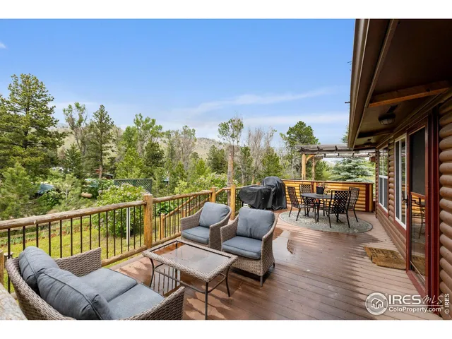 a view of roof deck with chairs