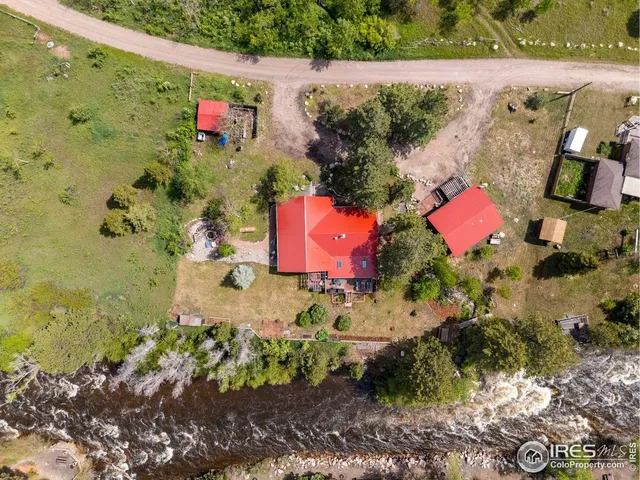a view of swimming pool with a yard