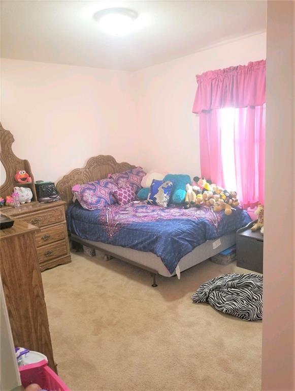 179 South Benbrook Road Butler, PA 16001 - Photo 9 of 21 a bedroom with a bed and window