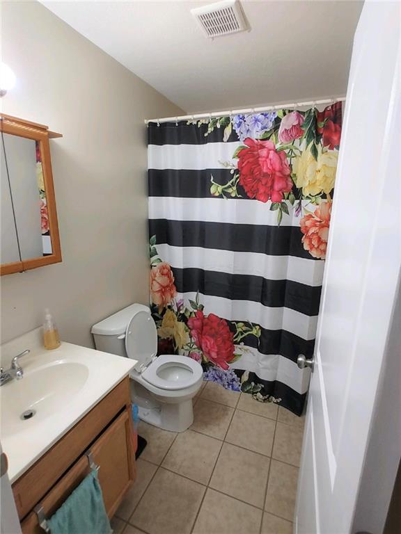 179 South Benbrook Road Butler, PA 16001 - Photo 10 of 21 a bathroom with a sink and a mirror