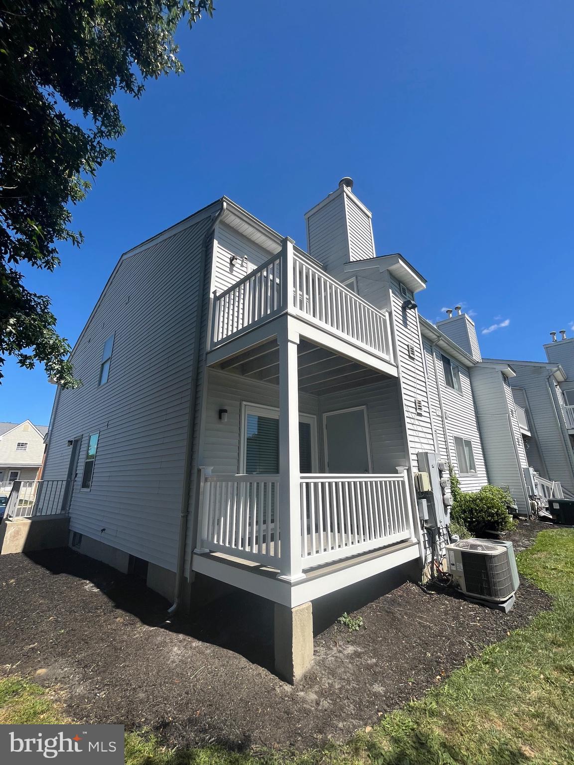 815 Woodchip Road Lumberton, NJ 08048 - Photo 11 of 32 a view of a house with a yard and deck