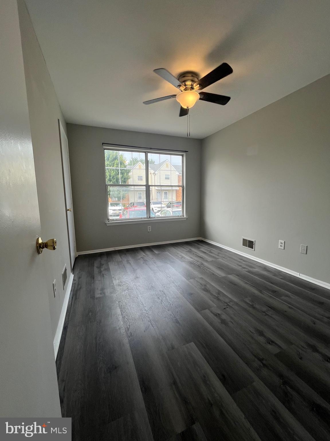 815 Woodchip Road Lumberton, NJ 08048 - Photo 13 of 32 wooden floor in an empty room with a window