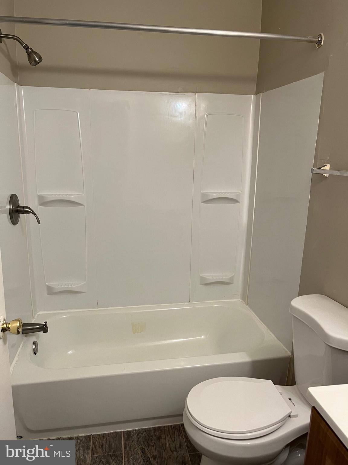 815 Woodchip Road Lumberton, NJ 08048 - Photo 26 of 32 a white toilet sitting next to a bath tub