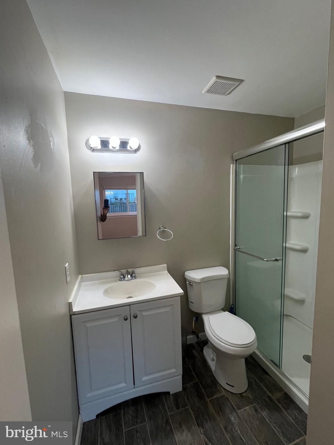 815 Woodchip Road Lumberton, NJ 08048 - Photo 27 of 32 a bathroom with a toilet sink and mirror