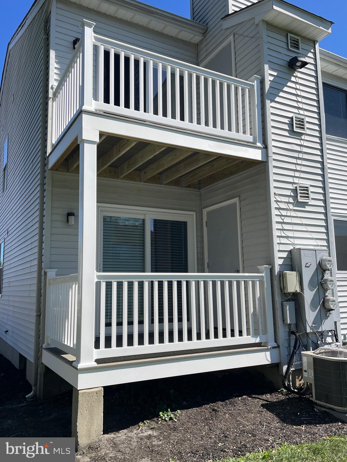 815 Woodchip Road Lumberton, NJ 08048 - Photo 4 of 32 a view of a wooden chair and a small yard