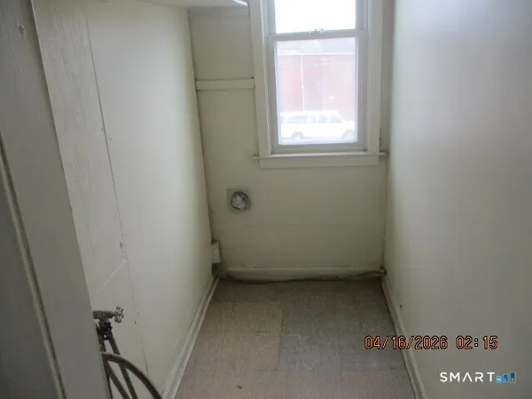 an empty room with a window