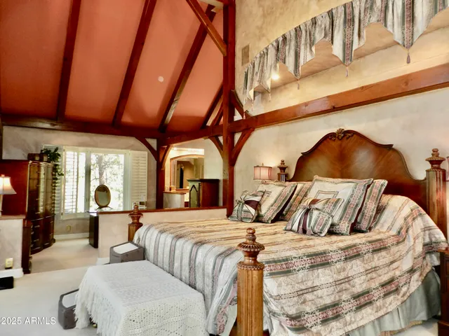 a bath tub sitting in a bathroom next to a window