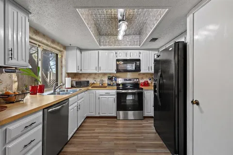 $315,000 | 1430 Wildvalley Drive, Lewisville, TX 75067