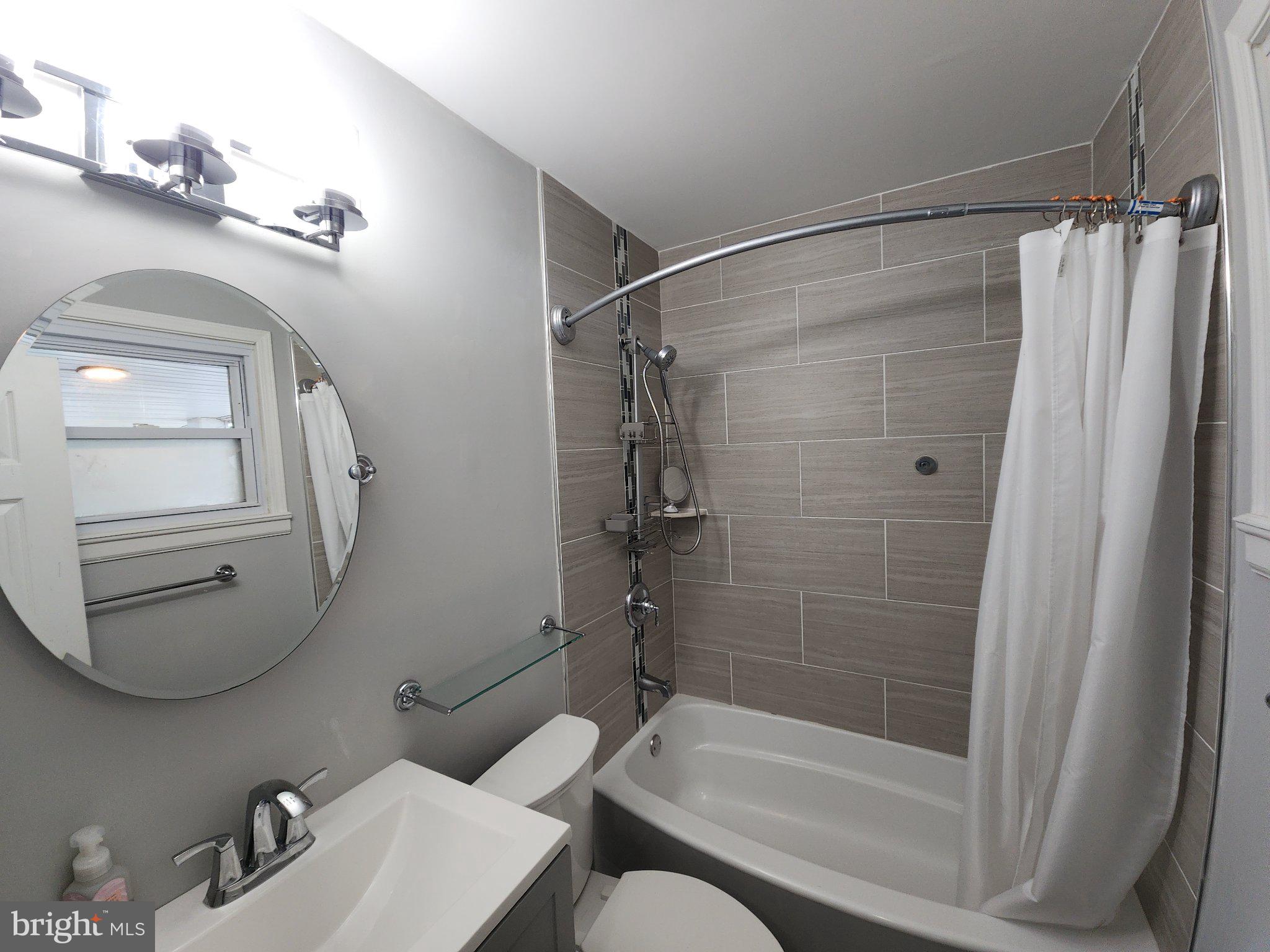 802 Devon Road Riverside, NJ 08075 - Photo 7 of 29 a bathroom with a shower a toilet and a sink