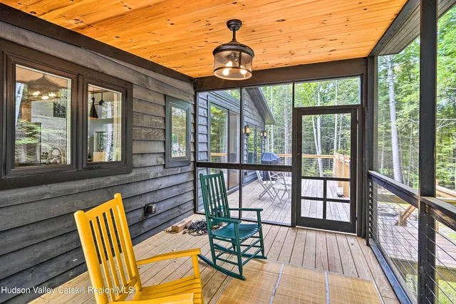 a view of pool with a backyard