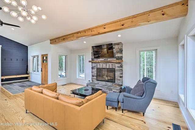 a kitchen with a table chairs and a stove