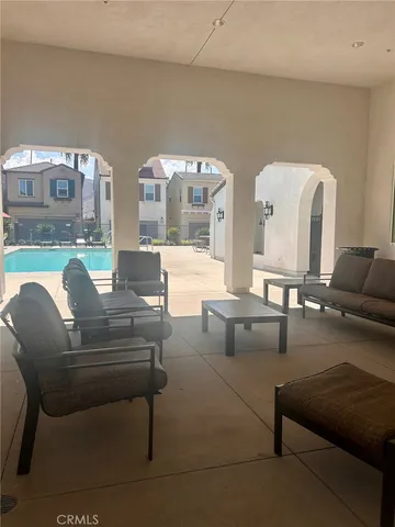 a living room with furniture and a table