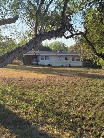 a front view of house with yard