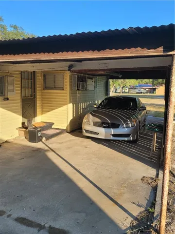 a front view of house with a ocean view