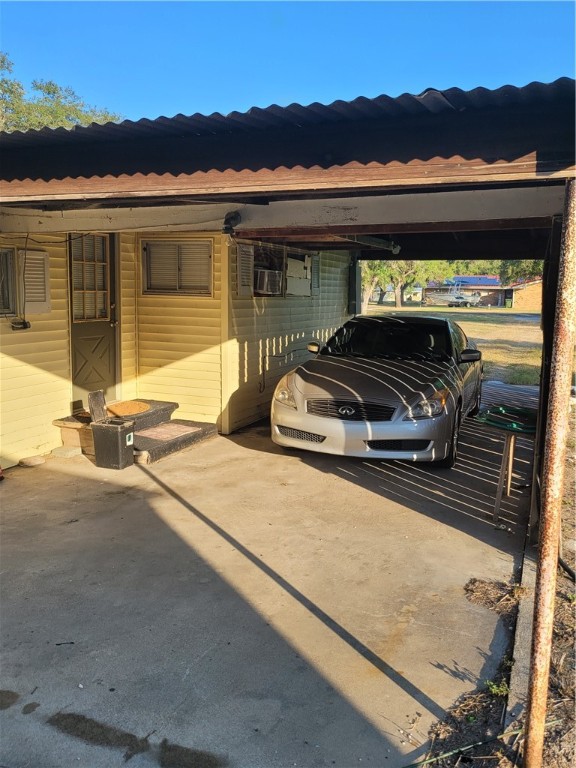 125 Harbor Circle Mathis, TX 78368 - Photo 3 of 12 a front view of house with a ocean view
