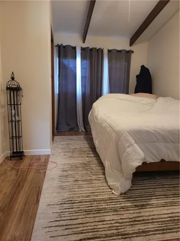 a large bed in a balcony