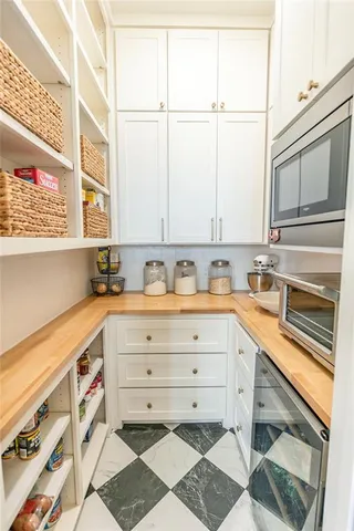 a bathroom with a sink and a window