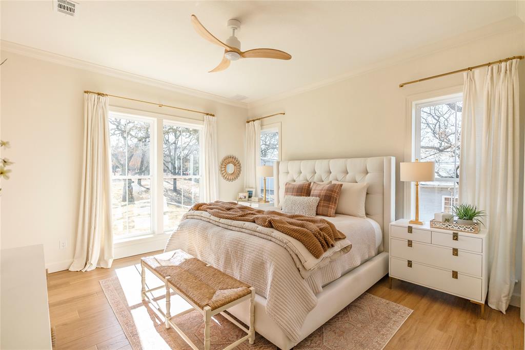 1061 Tradewinds Road Nocona, TX 76255 - Photo 15 of 40 a bed room with a bed and a large window