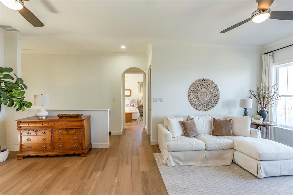 1061 Tradewinds Road Nocona, TX 76255 - Photo 26 of 40 a living room with furniture a couch and a potted plant