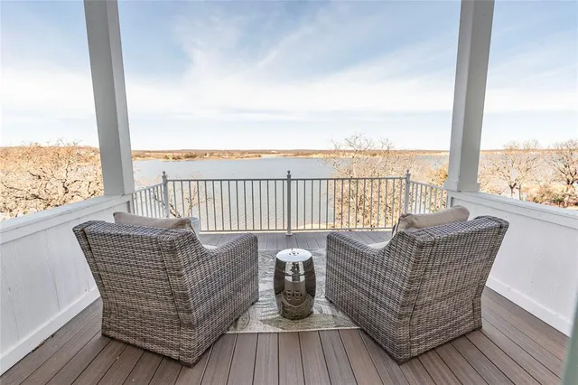 a view of balcony with furniture