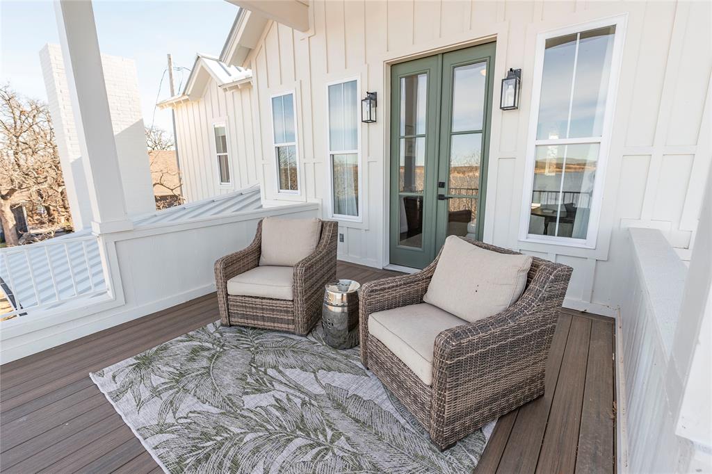 1061 Tradewinds Road Nocona, TX 76255 - Photo 29 of 40 a living room with furniture and a large window