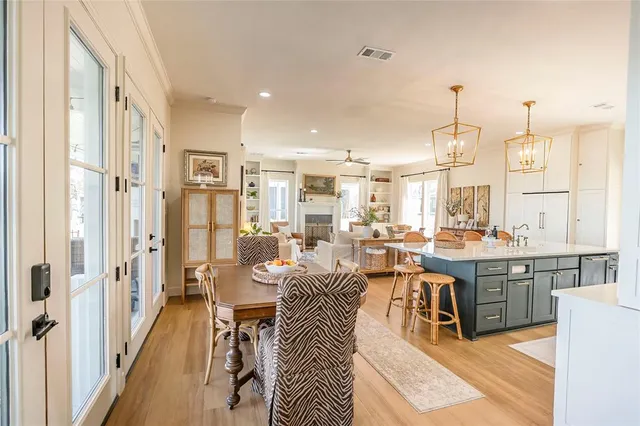 a view of a kitchen and dining room