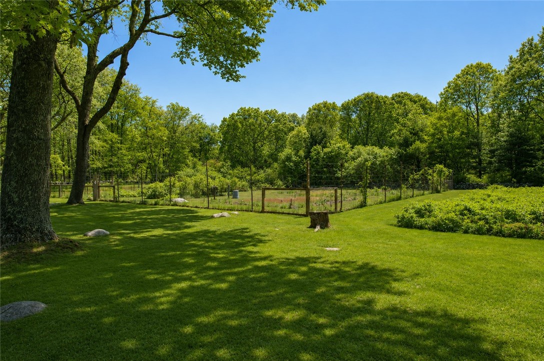 307 Stony Fort Road Saunderstown, RI 02874 - Photo 8 of 48 Thinking of a large vegetable garden? This garden is 100 X 100 and has established plantings including asparagus. Also, entriely fenced to keep out pesty animals. Connected to water for easy watering.