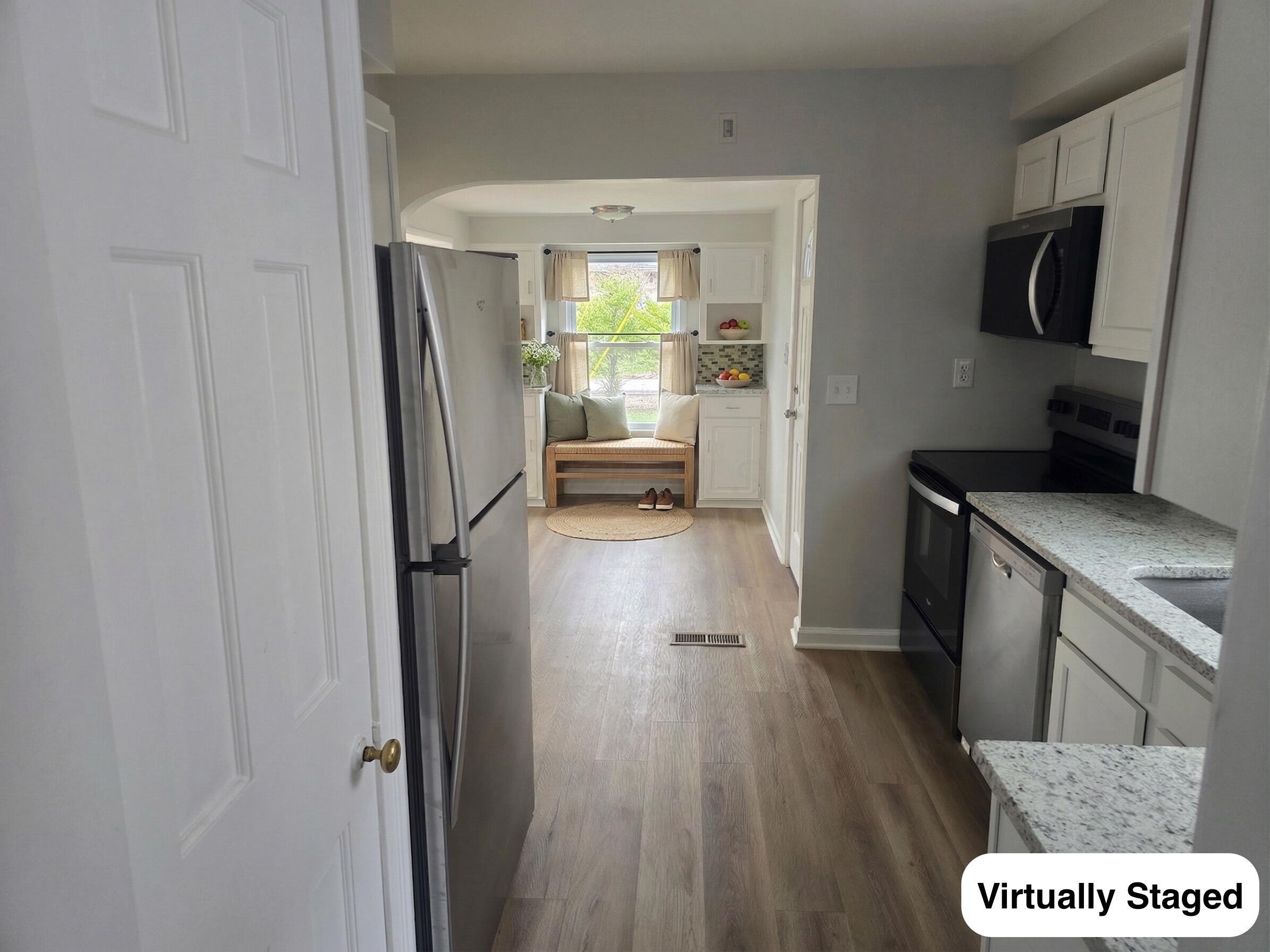 3950 Riverside Drive Columbus, OH 43220 - Photo 13 of 39 Virtually Staged Mud room Area in Kitchen