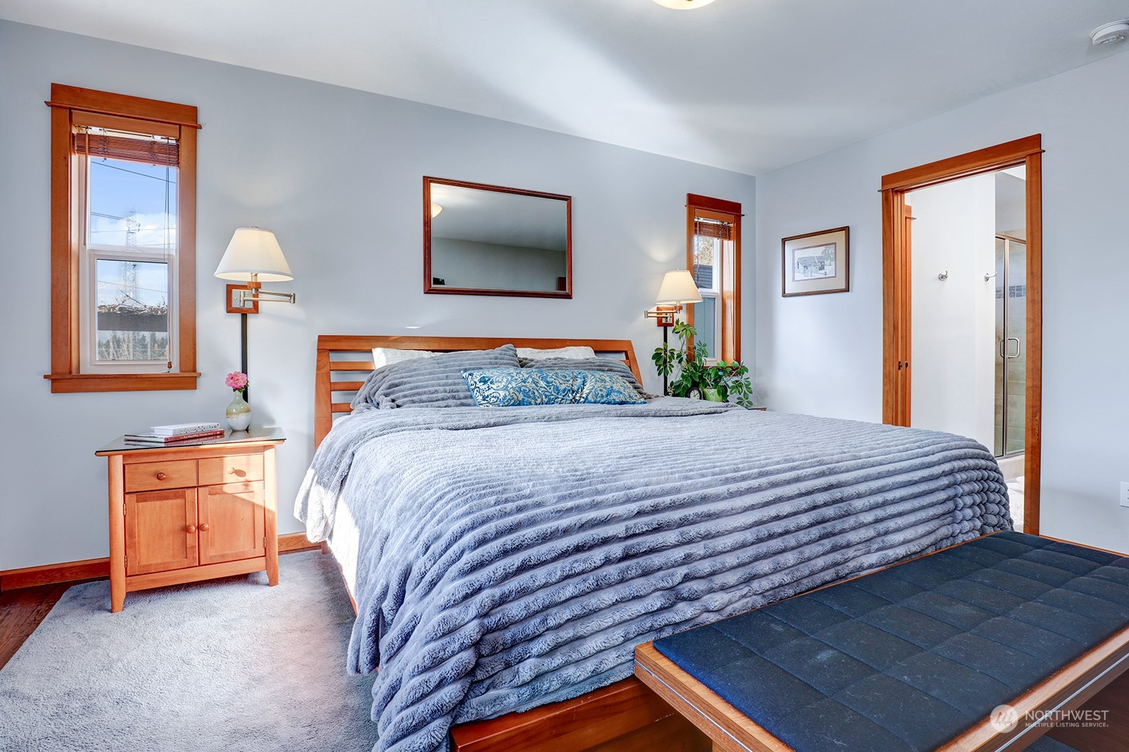 4202 157th Place Southeast Bothell, WA 98012 - Photo 15 of 24 a bedroom with a bed and dresser with mirror