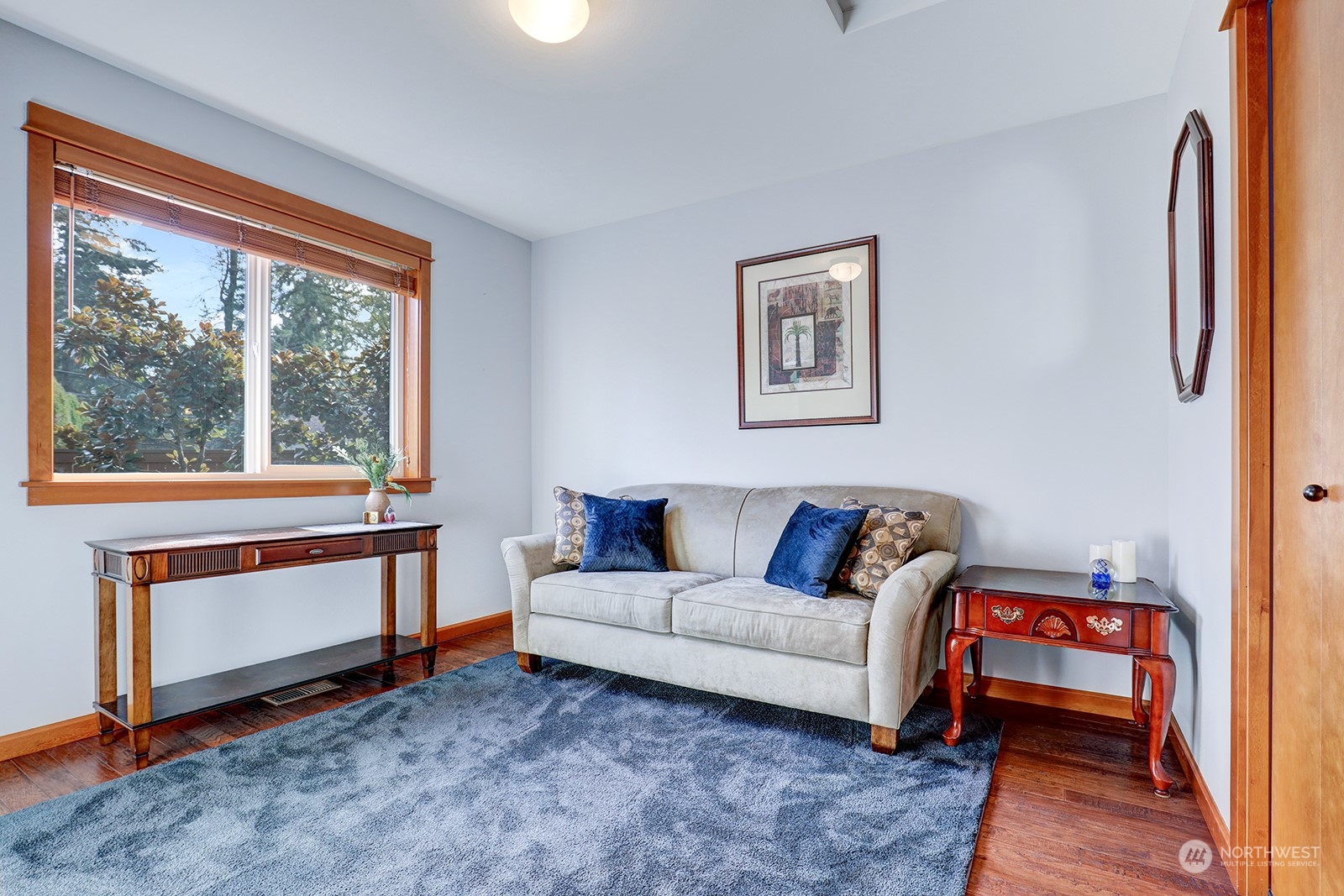 4202 157th Place Southeast Bothell, WA 98012 - Photo 5 of 24 a living room with furniture and a window