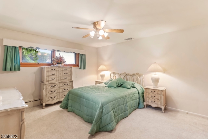 35 Hillside Avenue Netcong, NJ 07857 - Photo 19 of 41 a bedroom with a bed and a cabinets