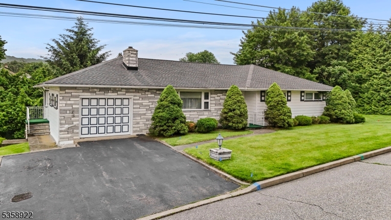 35 Hillside Avenue Netcong, NJ 07857 - Photo 2 of 41 a front view of a house with garden