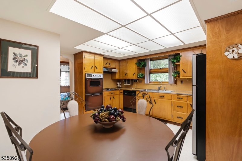 35 Hillside Avenue Netcong, NJ 07857 - Photo 23 of 41 a kitchen with stainless steel appliances kitchen island granite countertop a sink and cabinets