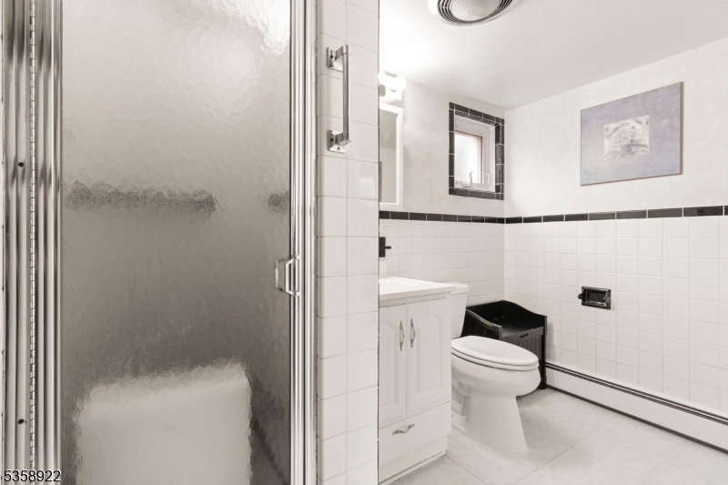 35 Hillside Avenue Netcong, NJ 07857 - Photo 37 of 41 a bathroom with a toilet and a shower