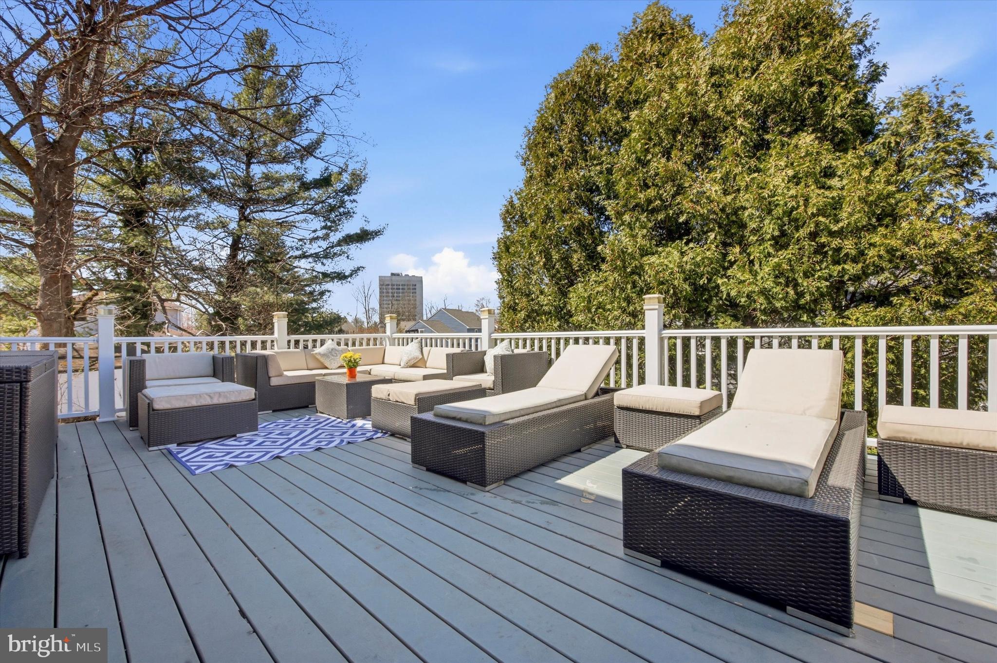 1 Country Village Way Media, PA 19063 - Photo 17 of 50 a view of roof deck with couches wooden floor and fence