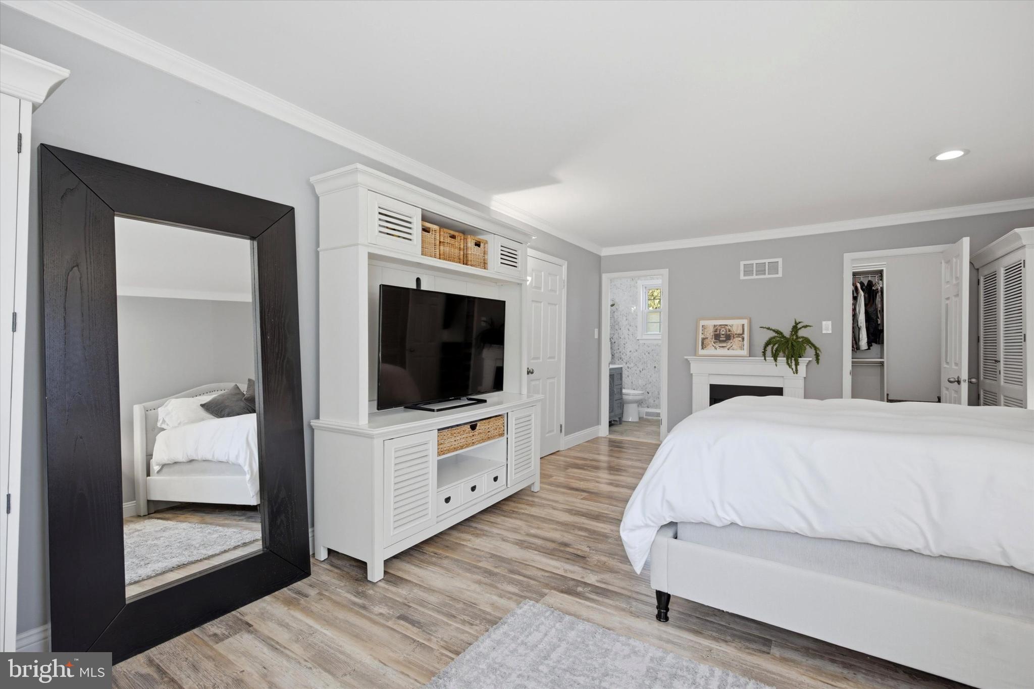 1 Country Village Way Media, PA 19063 - Photo 29 of 50 a bedroom with a bed and a flat screen tv