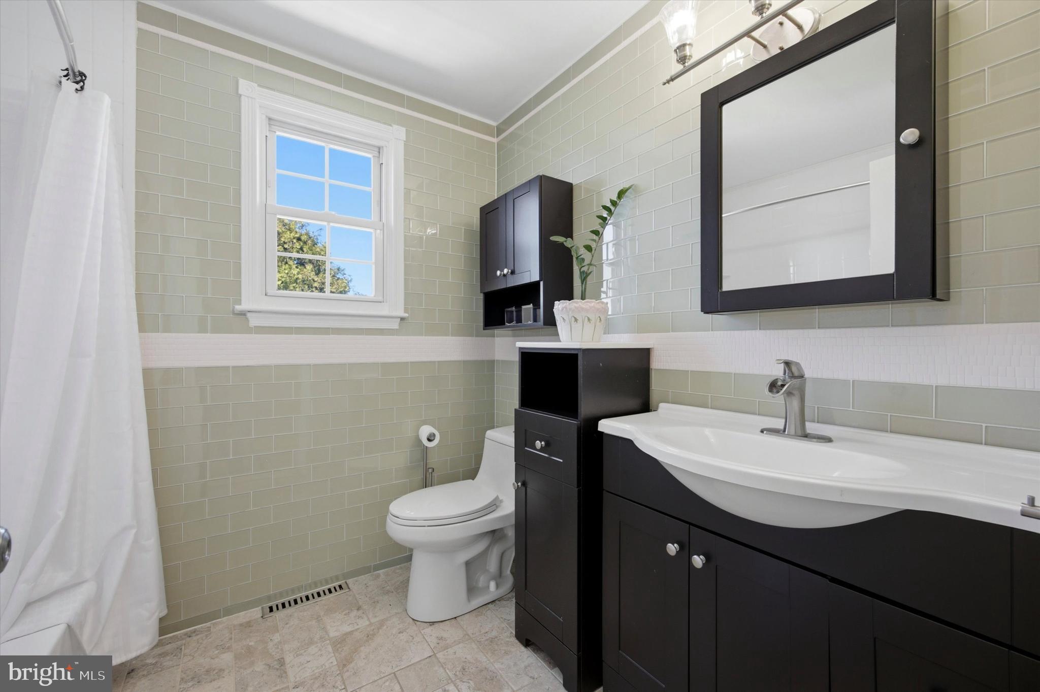 1 Country Village Way Media, PA 19063 - Photo 38 of 50 a bathroom with a toilet sink and mirror