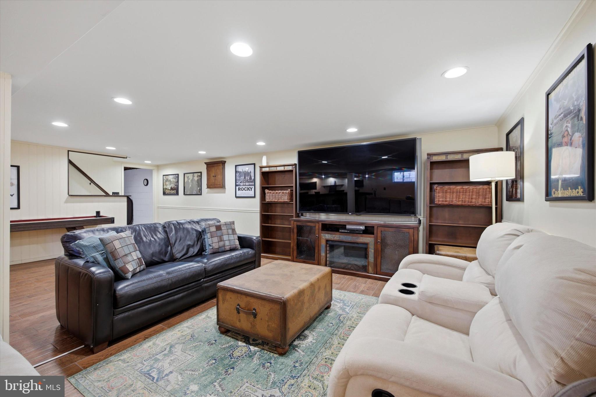 1 Country Village Way Media, PA 19063 - Photo 42 of 50 a living room with furniture and a flat screen tv