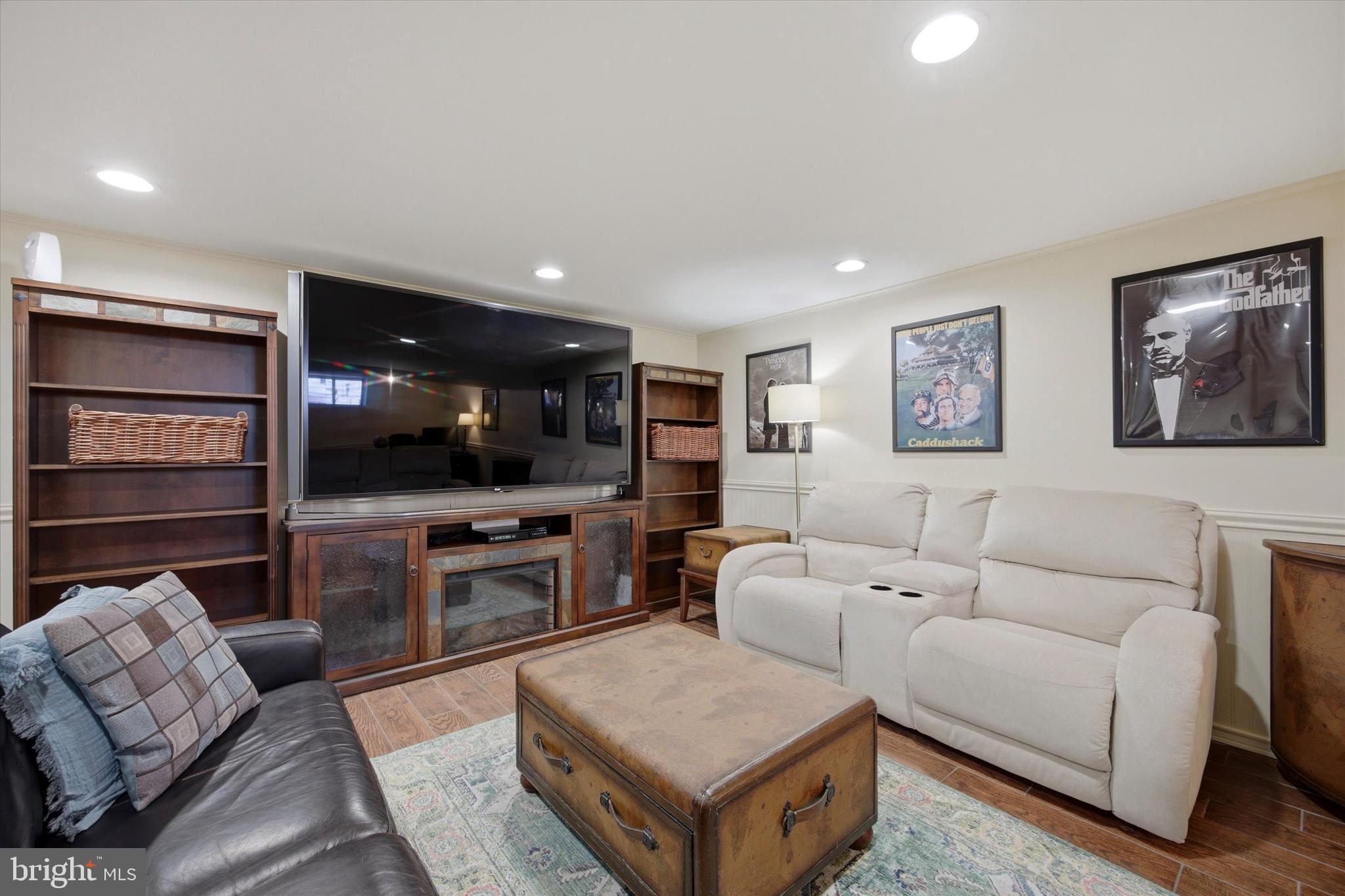 1 Country Village Way Media, PA 19063 - Photo 43 of 50 a living room with furniture and a flat screen tv